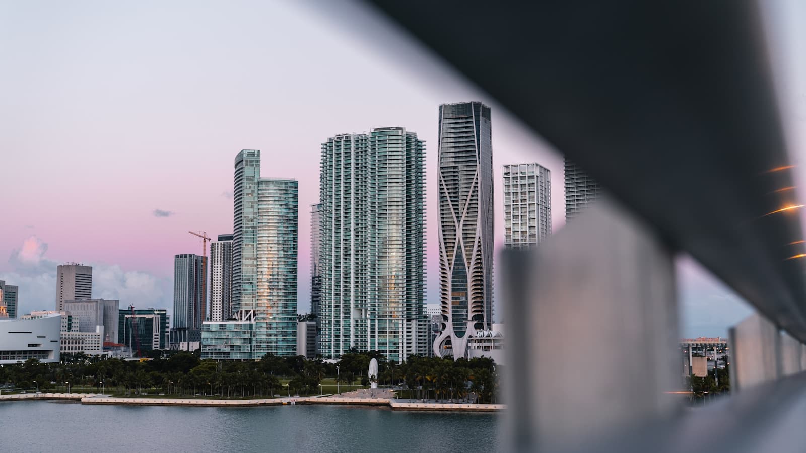 brickell skyline at dusk over biscayne bay, the buildings all looking like they bill at the same hourly rate