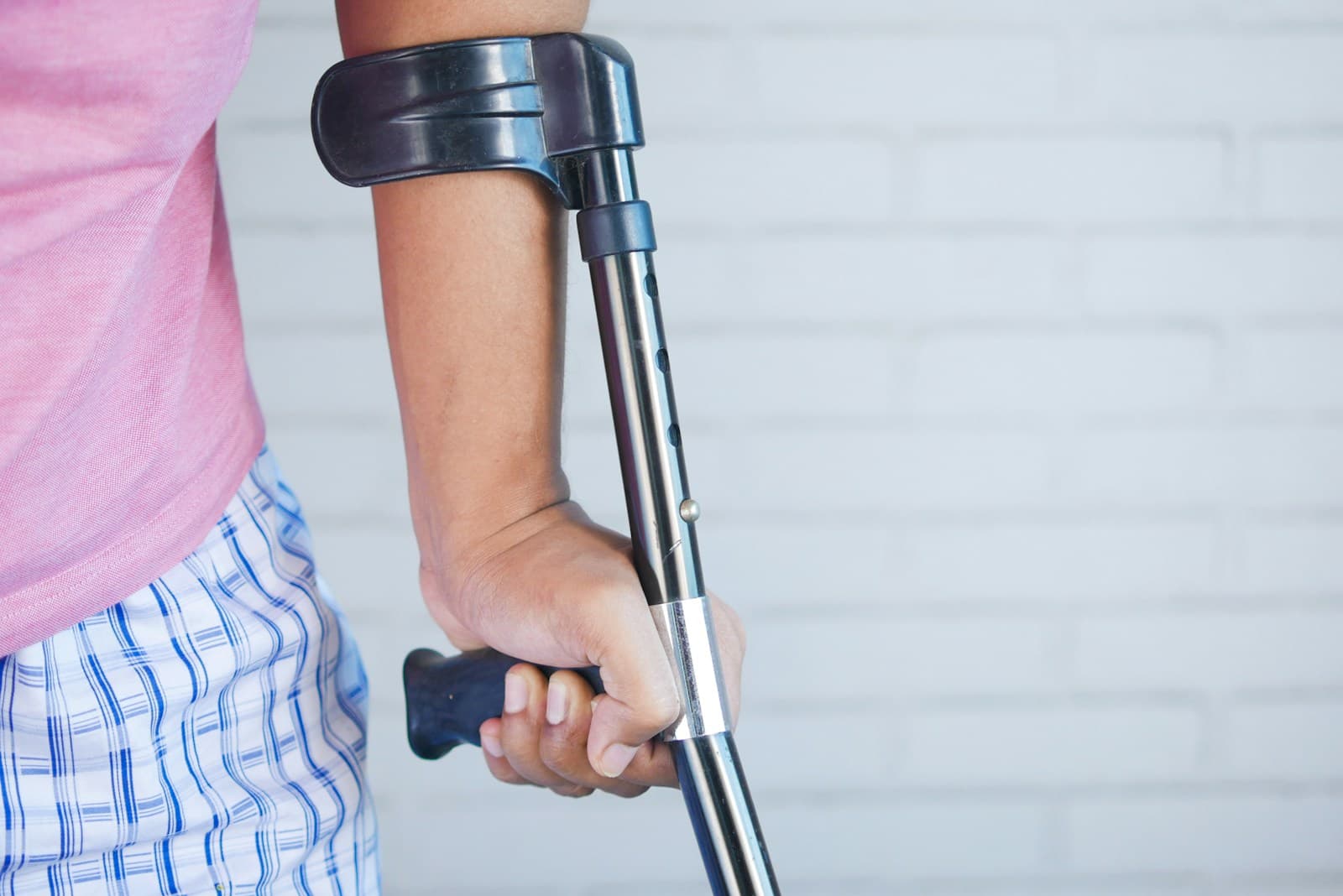 person with crutch and cane, intake form already sent to four firms
