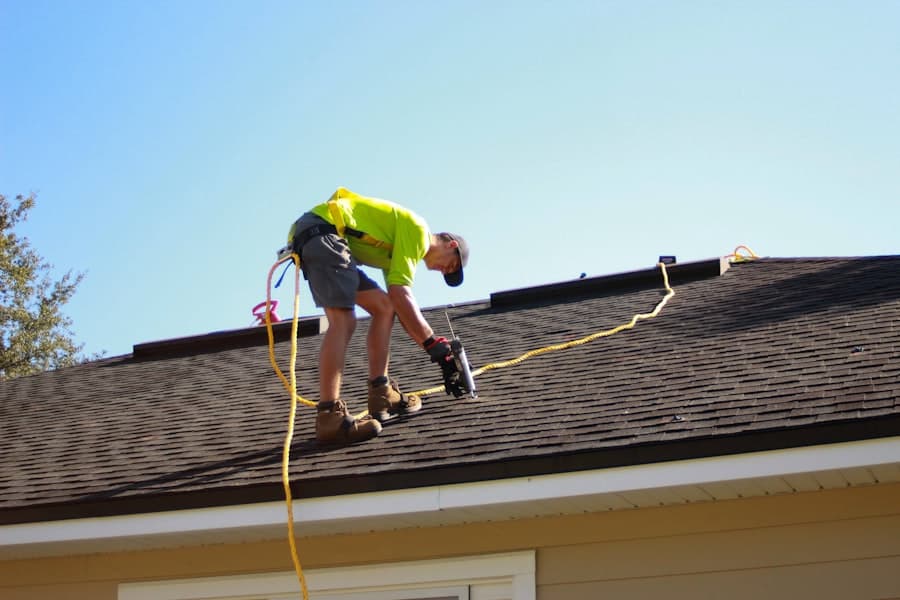 Roofer working on a residential roof