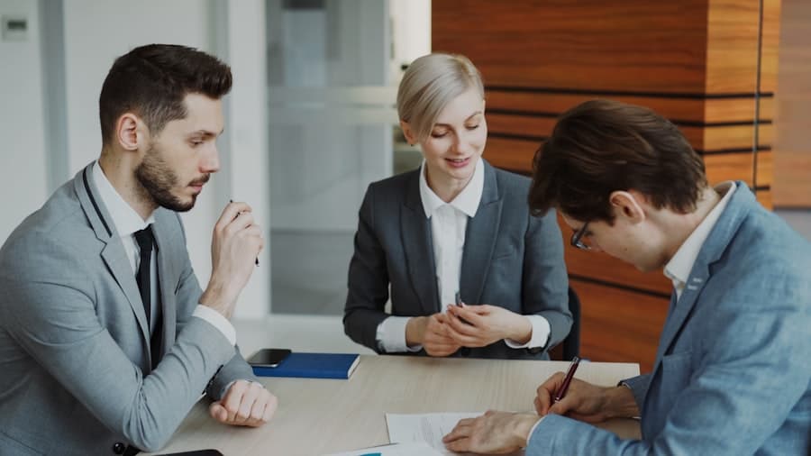 Advisors meeting with a client