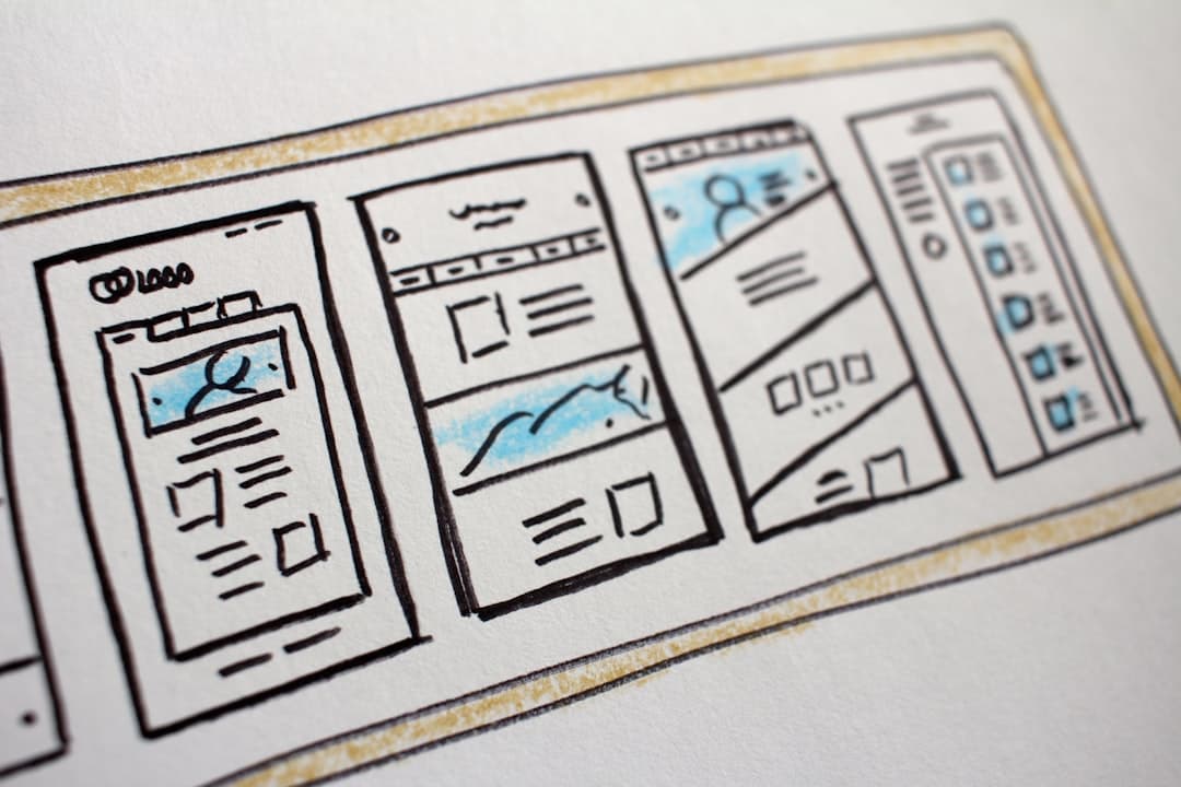 Landing page wireframe sketched on paper next to a phone, showing where cost per lead quietly leaks