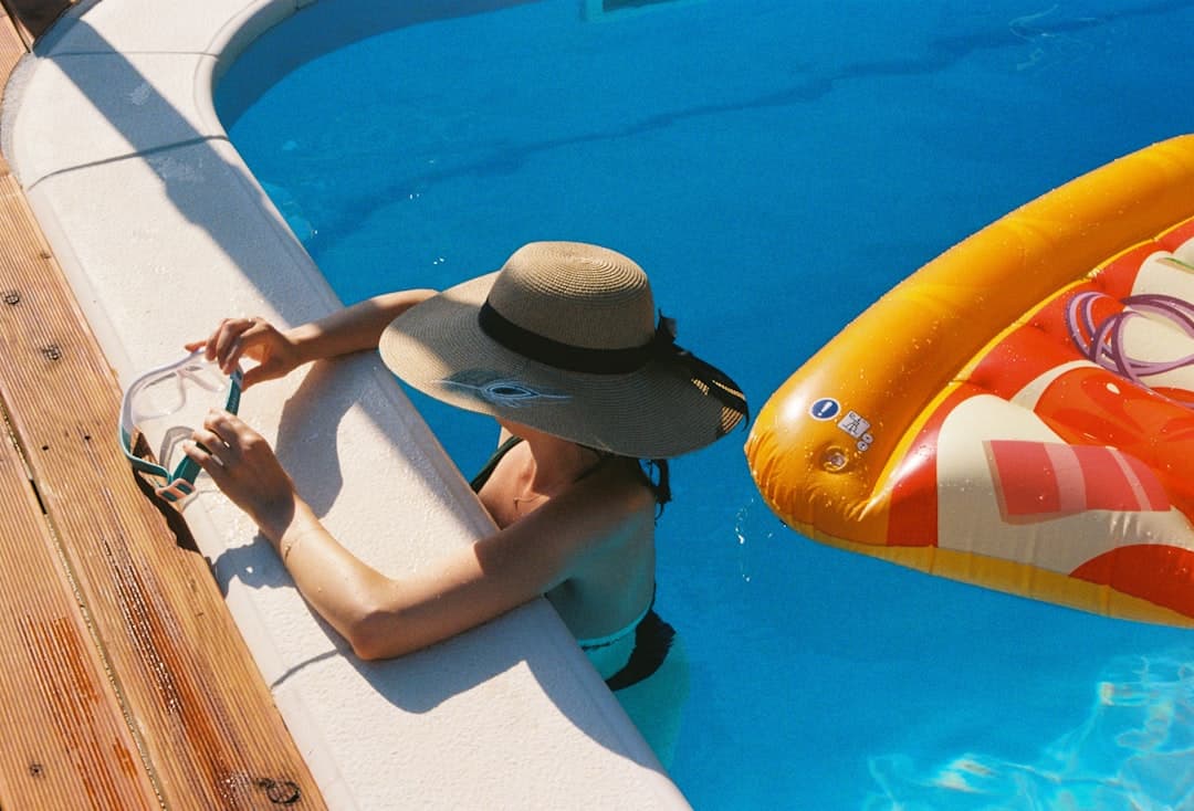 Pool service technician at residential pool, gate code finally memorized