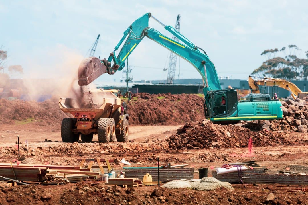 Contractor reviewing plans at a job site, the kind of booked work that ads for contractors should produce