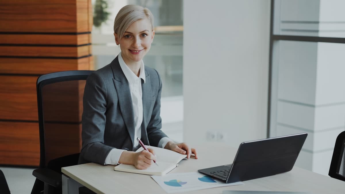 Insurance agent at desk with laptop, cold-call list permanently retired