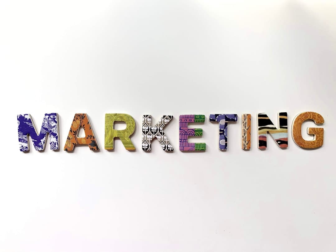 Whiteboard covered in marketing channel arrows during a marketing attribution mapping session