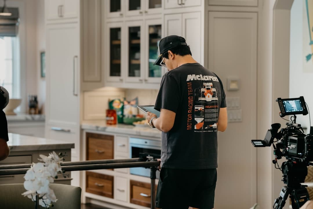 Plumber working under residential sink, after-hours inquiries finally booking