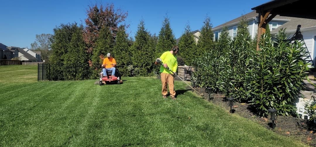 Landscaping crew arriving at a residential property for a fast lead response estimate booked through an automated calendar